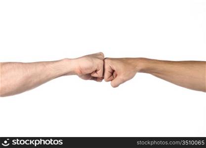 Two fists beat each other meet in a point