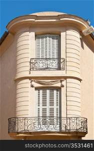Two French Windows on the Facade of old House
