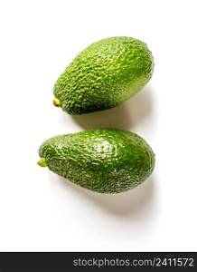 Two fresh avocados isolated on a white background. Two avocados isolated on a white background