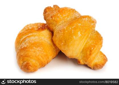 Two fresh just baked croissants on white background, isolated