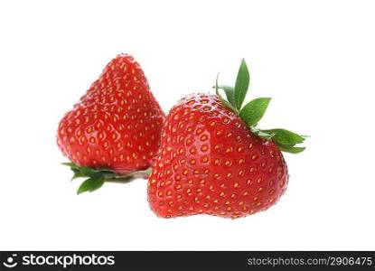 two  fresh red strawberries with leaves