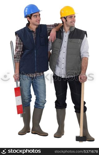 Two friendly male builders