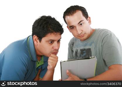 Two friends looking surprised at tablet computer against a white background