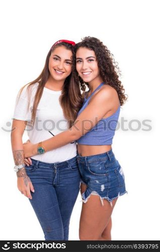 Two friends posing in studio isolated over a white background