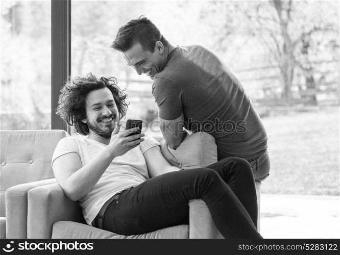 Two friends watching video on mobile