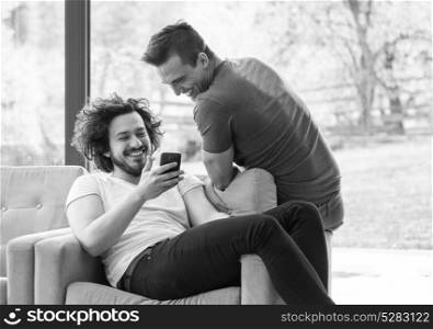 Two friends watching video on mobile