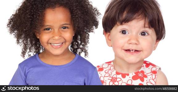 Two funny little girls smiling isolated on a white background