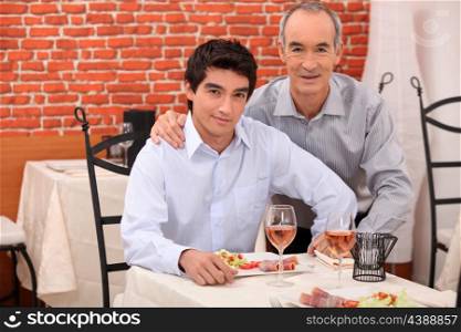 Two generations sitting in a restaurant
