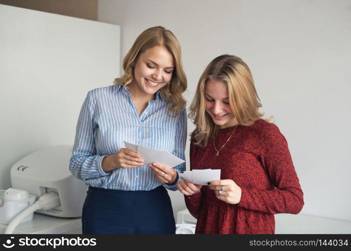 Two girlfriends consider they donated the tickets.. Beautiful girlfriends consider gift certificates 9074.