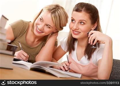 Two girls doing homework