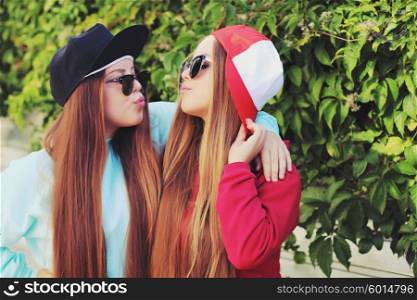 Two girls doing the kiss face