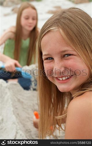 Two Girls Playing on Beach