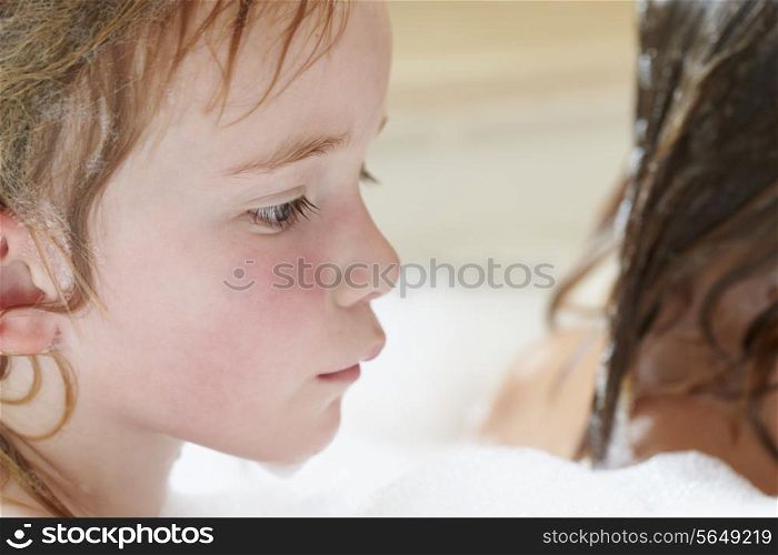 Two Girls Sharing Bubble Bath