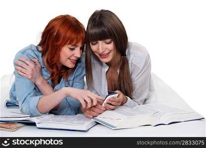 two girls studying together