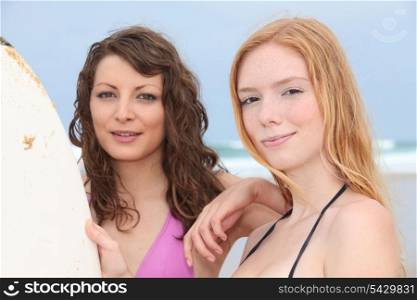 two girls surfing