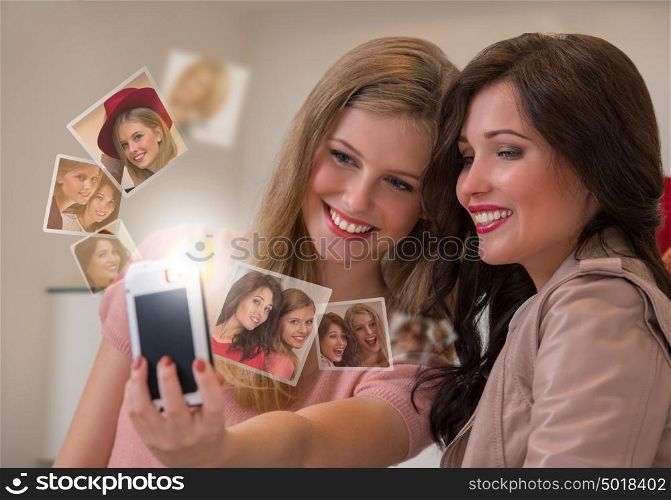 Two girls taking selfie by smartphone