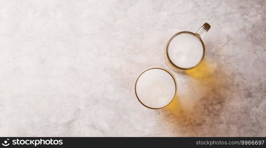 Two Glass of Beer on Table. Couple or Two Friends Drinking Beer Concept. Happy Hours, Hangout or Celebrate in Restaurant and Bar, For Oktoberfest or any Cheerful Event. Top View 