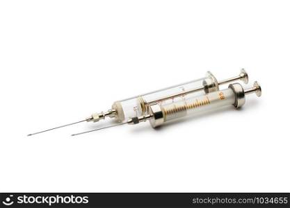 Two glass syringes isolated on white background