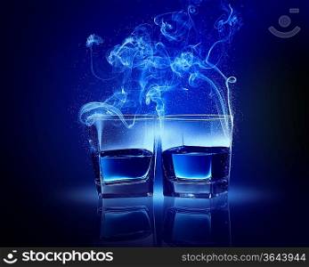 Two glasses o0 blue cocktail with fume going out