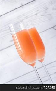 Two glasses of bellini cocktail