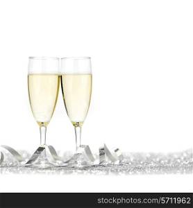 Two glasses of champagne with bow on silver background