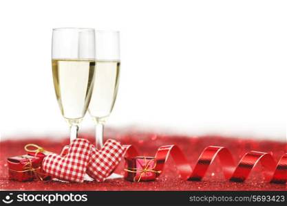 Two glasses of champagne with red decor, Valentines day concept