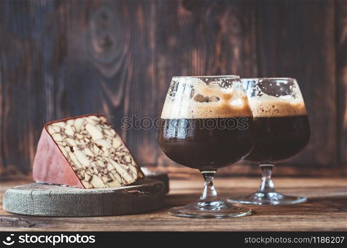 Two glasses of dark beer with Irish Porter Cheddar