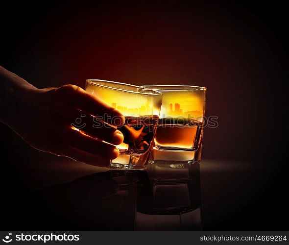 Two glasses of whiskey. Image of two glasses of whiskey with city illustration in