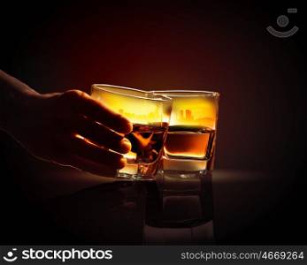 Two glasses of whiskey. Image of two glasses of whiskey with city illustration in