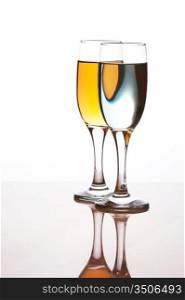 two glasses with drinks isolated on a white background