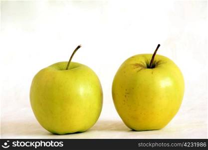 Two green apples isolated on white background