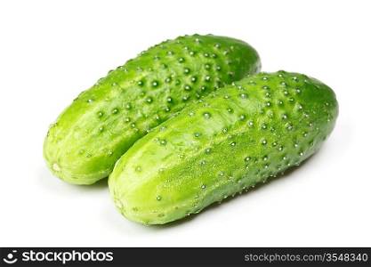 Two green cucumbers isolated on white background