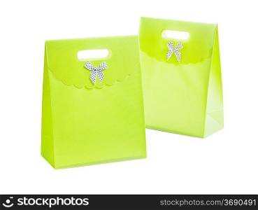 two green paperbags isolated on white