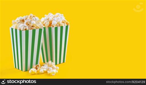 Two green white striped carton buckets with tasty cheese popcorn, isolated on yellow background. Box with scattering of popcorn grains. Fast food, movies, cinema and entertainment concept.