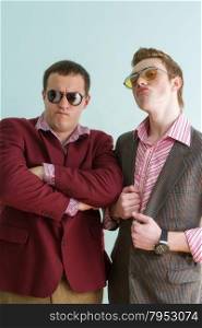 two guys with glasses and retro costumes. portraits