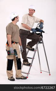 Two handymen at work.