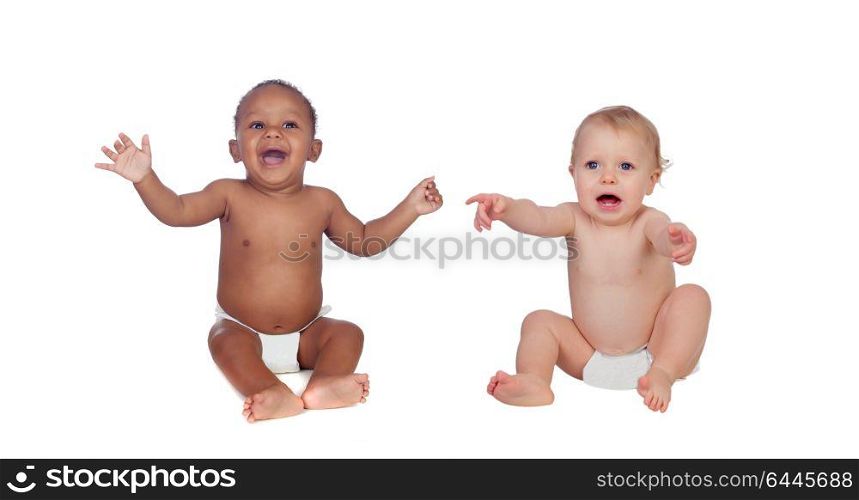 Two happy babies of different races isolated on a white background