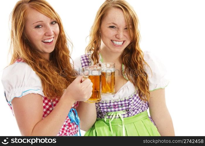 two happy bavarian girls with beer. two happy bavarian girls with beer on white background