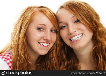 two happy bavarian redhead girls. two happy bavarian redhead girls on white background