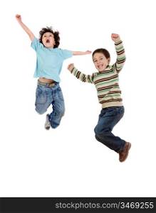 Two happy children jumping at once on a white background
