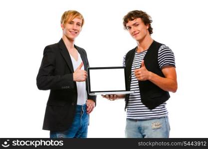 Two happy men showing laptops blank screen. Isolated on white&#xA;