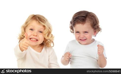 Two happy small children saying Ok and laughing isolated on a white background