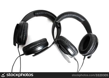 Two headphones isolated on a white background