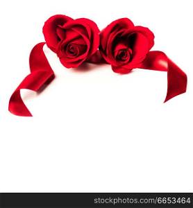Two heart shaped red roses and ribbons isolated on white background, Valentines day. Heart shaped roses