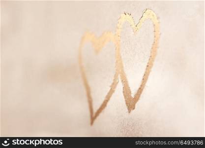 Two hearts, drawing on the snowy background, abstract winter background, heart to heart, romantic message for Valentines day, love concept. Heart to heart