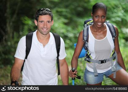 Two hikers in the woods