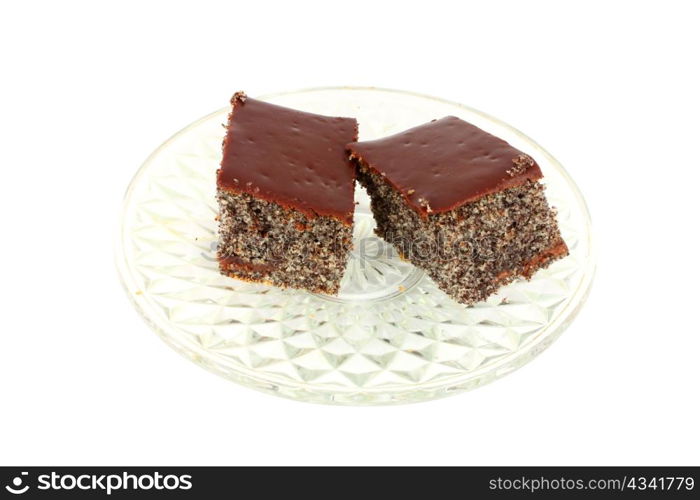 Two homemade poppy cakes on plate isolated on white