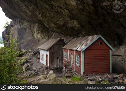 two houses of ancient settlement below rock Helleren, Jossingfjord, Stavanger, Southern Norway