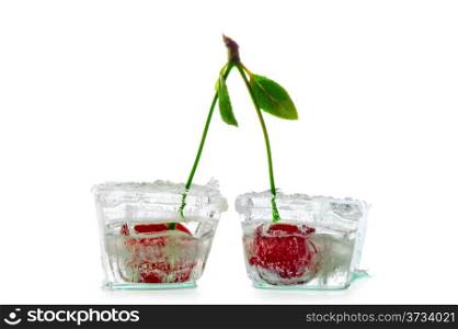 two ice cubes with cherry