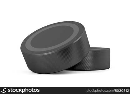 Two ice hockey pucks on white background